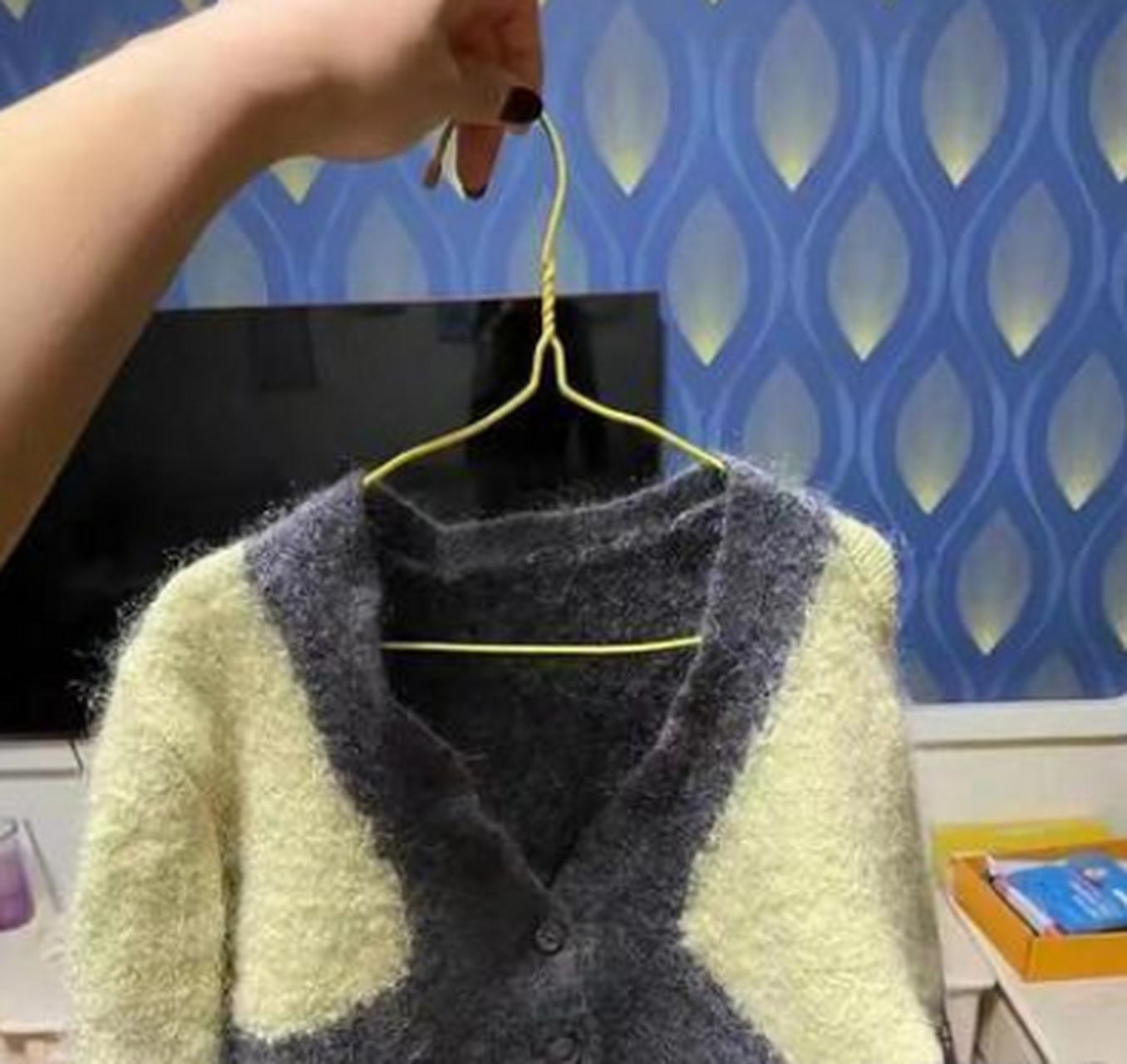 请问羊毛衫缩水了会变成啥?答:小羊毛衫!