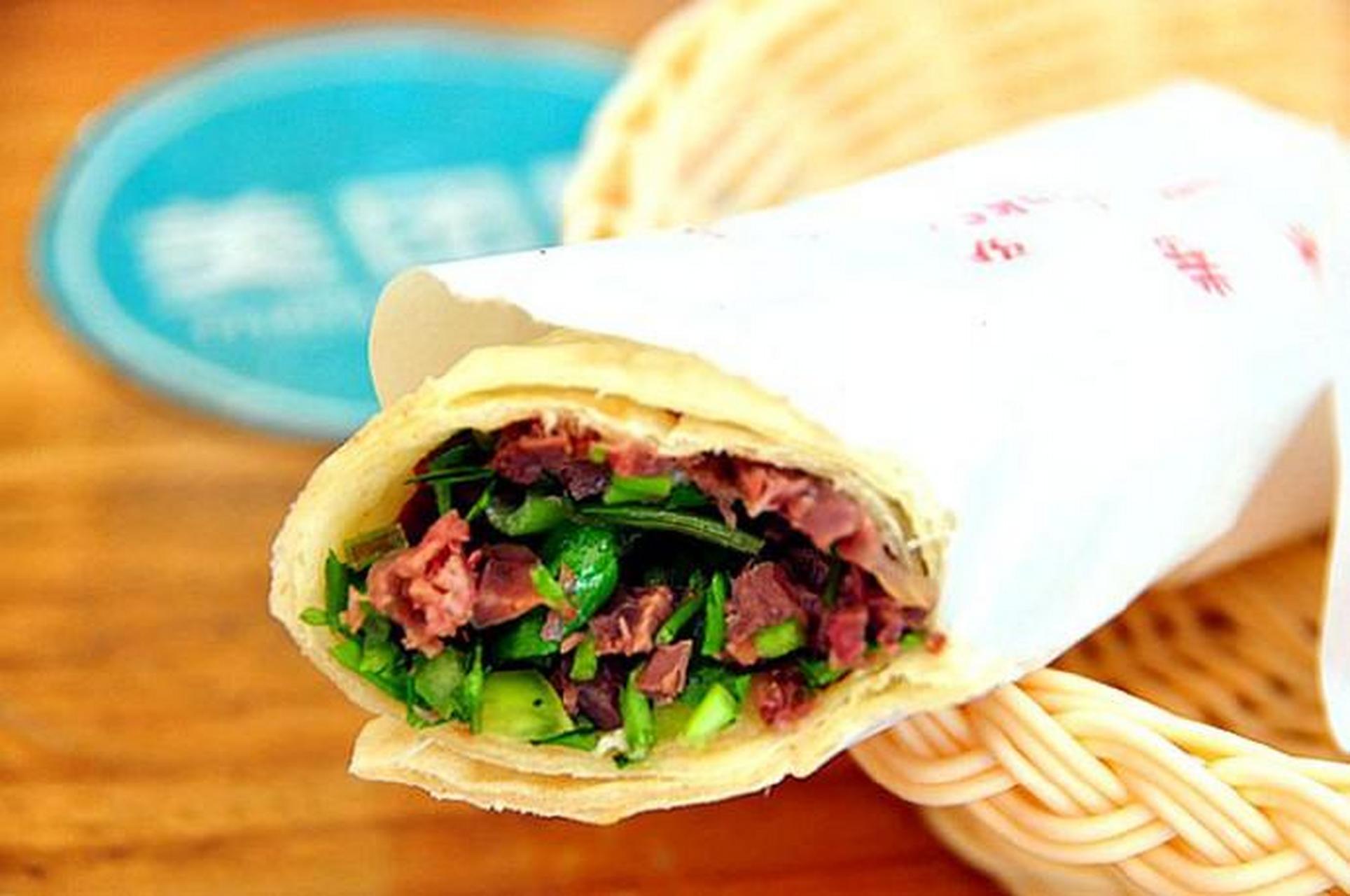 来邯郸必吃美食:驴肉卷饼.驴肉面包是武安县的特产.