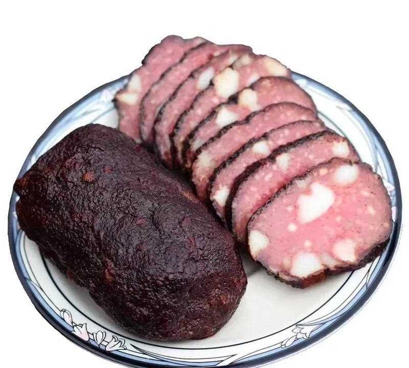 血粑,也叫猪血圆子,因为是圆的,由豆腐,剁碎的肉末加上猪血特制而成