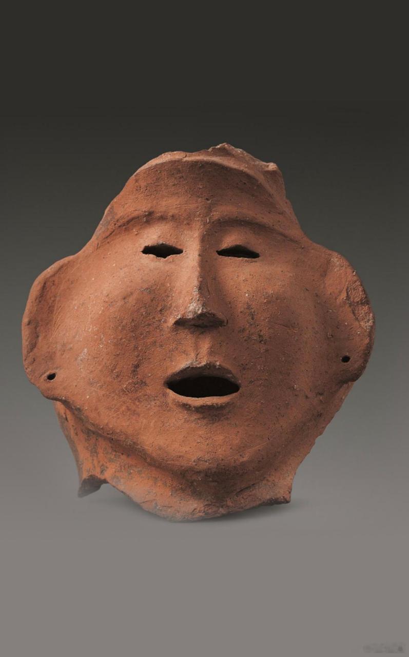 仰韶文化红陶人面像甘肃省博物馆//藏