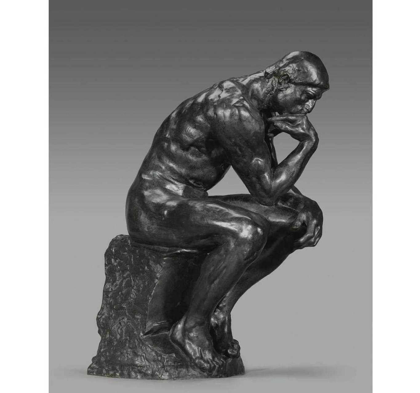 思想者(le penseur)奥古斯特·罗丹安置在群雕"地狱之门"横楣上一座