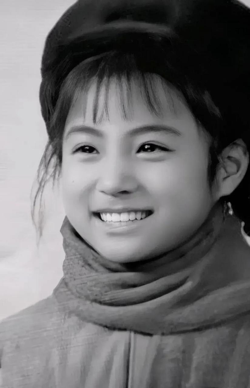 70年代,一张清纯,灿烂的小姑娘照片风靡全国.