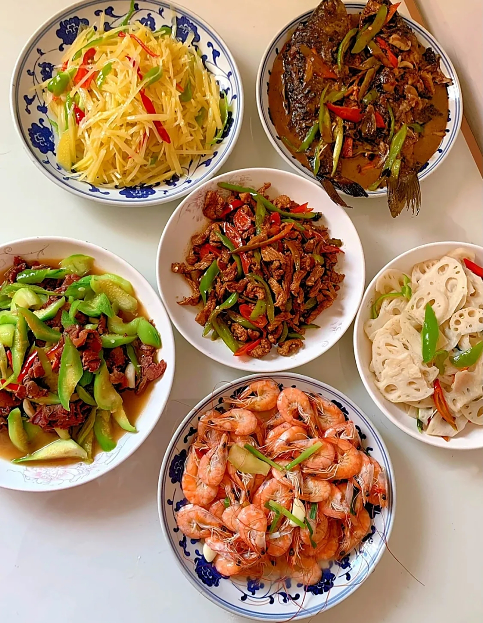 图一,广东普通家庭的晚餐 图二,江苏普通家庭的晚餐 图三,福建普通