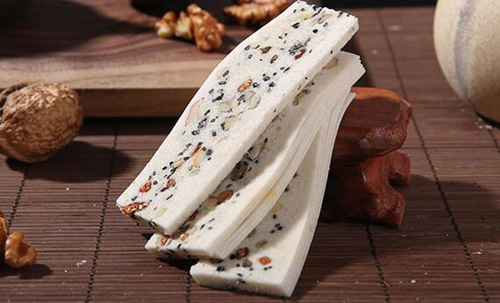 合川桃片,重庆市合川区特产. 合川桃片,是一种由糯米,核桃,面粉,白糖