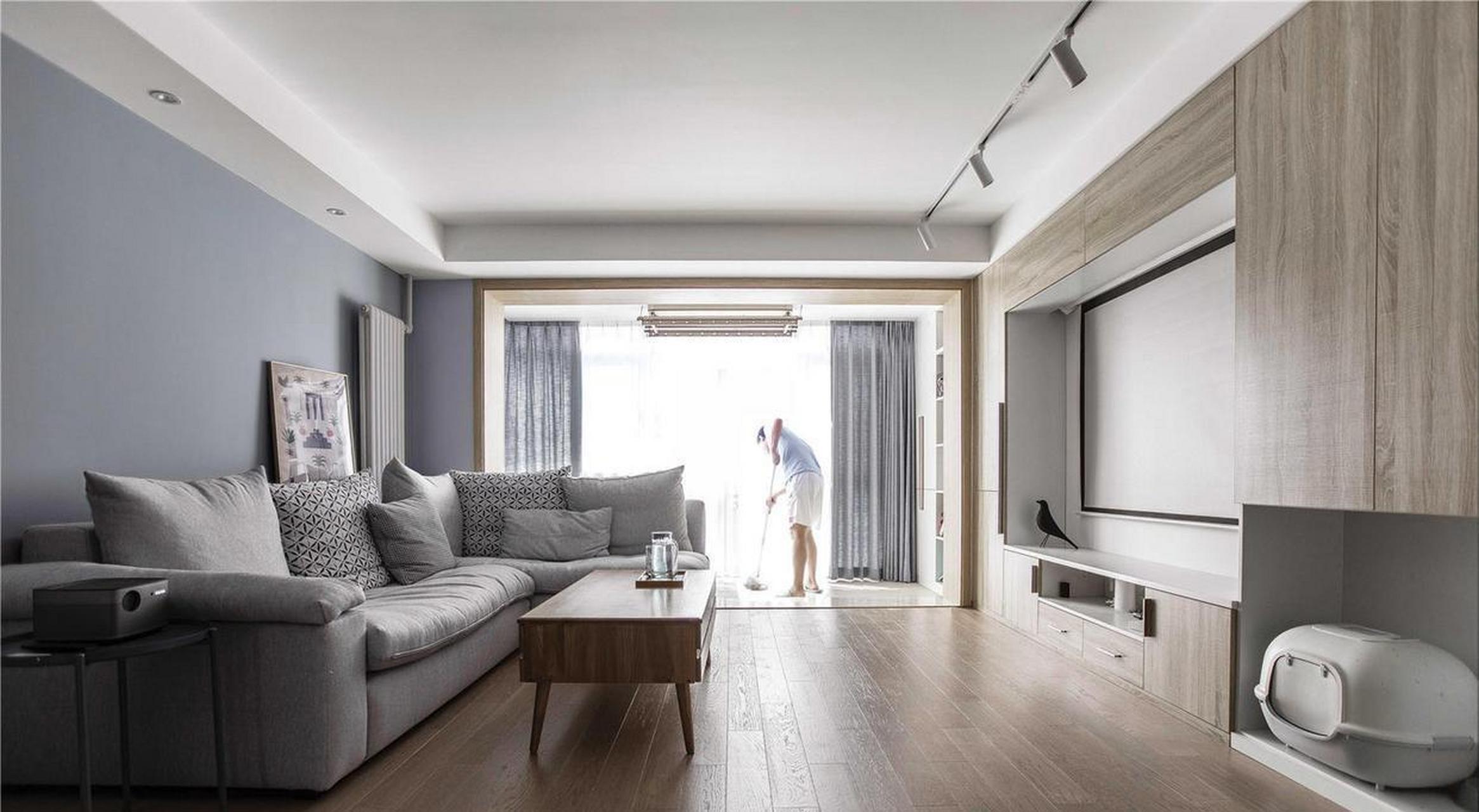 灰蓝色的乳胶漆做背景墙搭配木色和白色营造了一个简约温馨的居家氛围