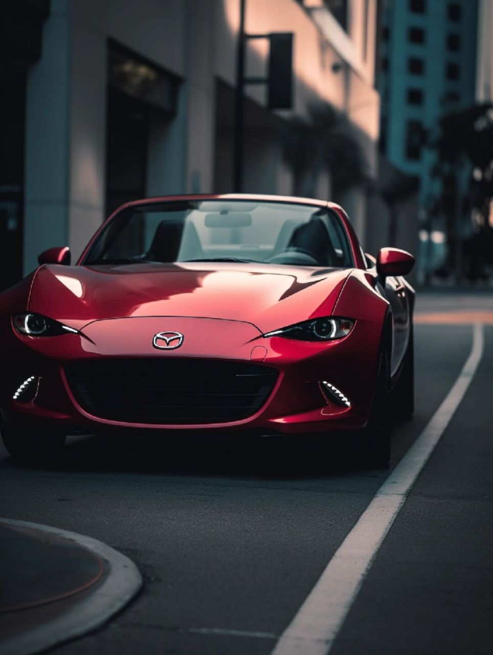 介绍马自达mx-5的双门双座敞篷跑车:  马自达mx-5:轻量化与操控乐趣