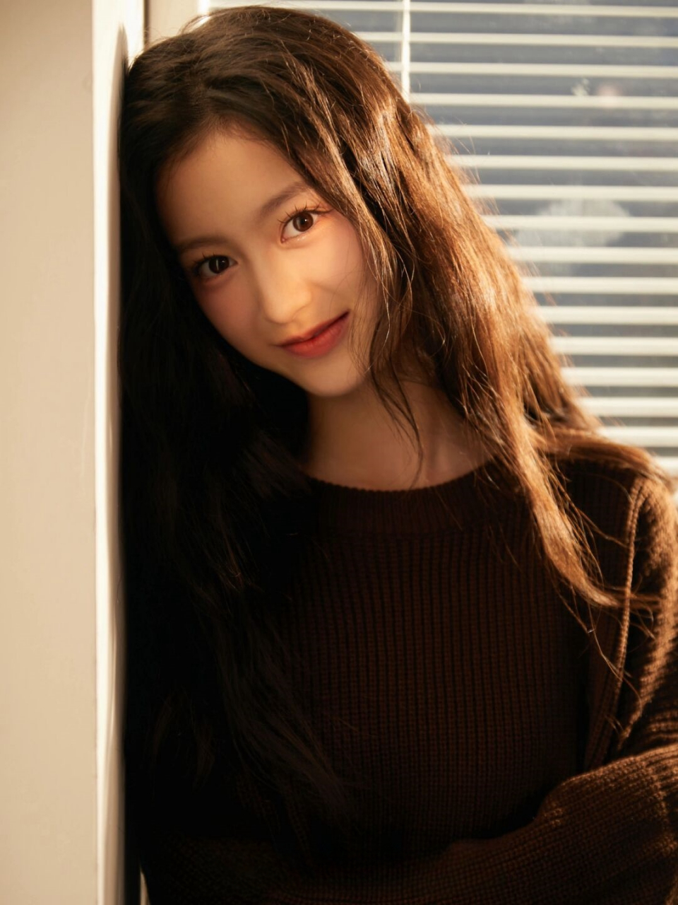 捕捉瞬间之美: 裴佳欣的氛围感写真艺术  温暖而悠