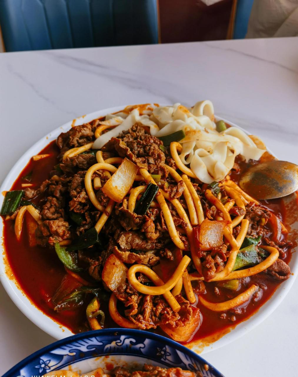 兰州市西固区南滨河路的丁家炒肉片 这家总是跟南滨河路区域另一家做