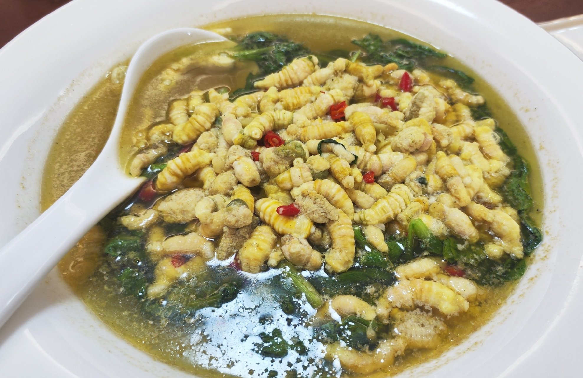 朋友请我去吃饭,点了一道她认为十分霸道的菜--豆丹!