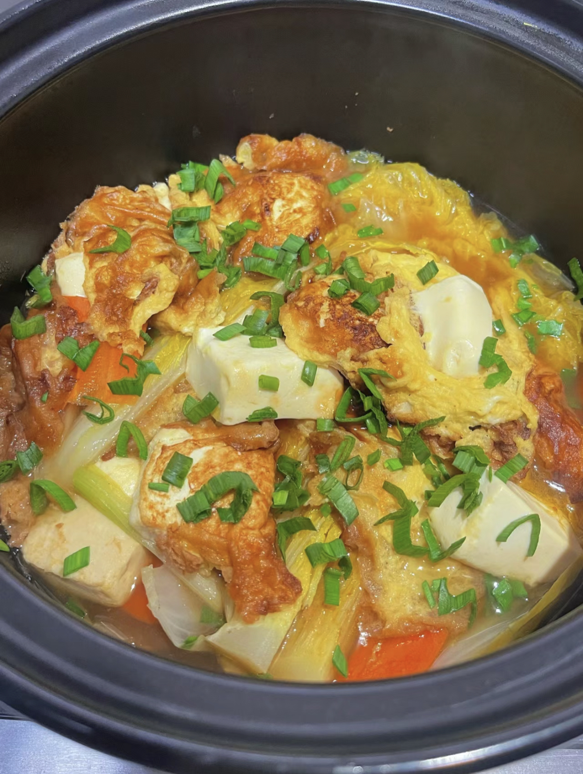 做法准备豆腐和鸡蛋将豆腐扣入碗中铺均匀