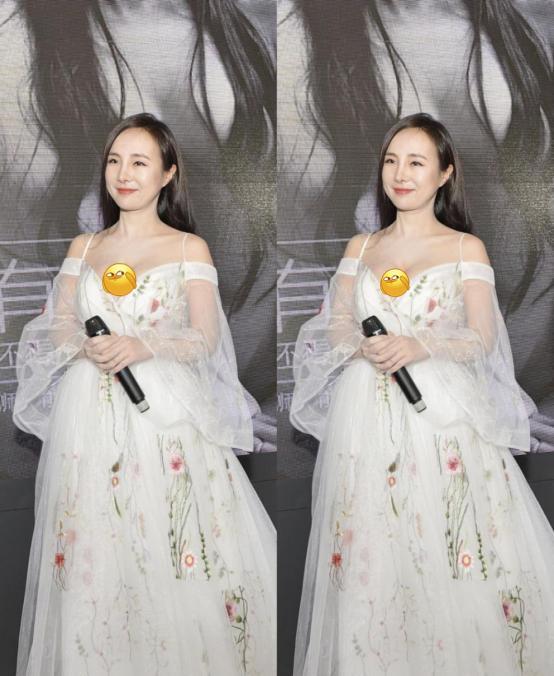 "最美车模"干露露,身材抢镜,穿着蕾丝长裙,露出小腹