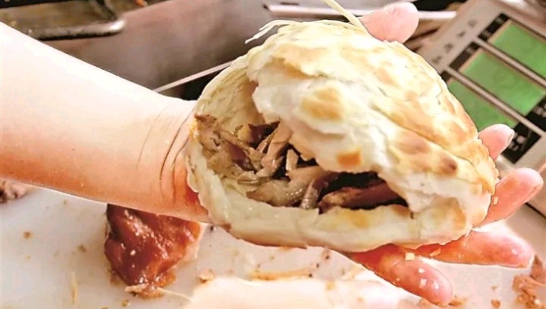 芮城东娃卤肉何以飘香黄河两岸?卤汤锅中为何有块石头放了30多年