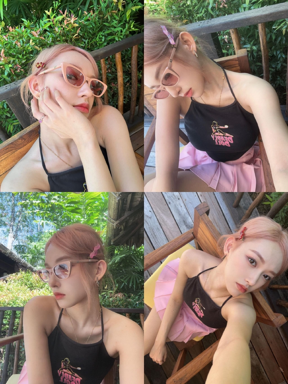 组图:程潇晒海边限定美照 粉发粉裙粉色墨镜配黑色抹胸火辣十足