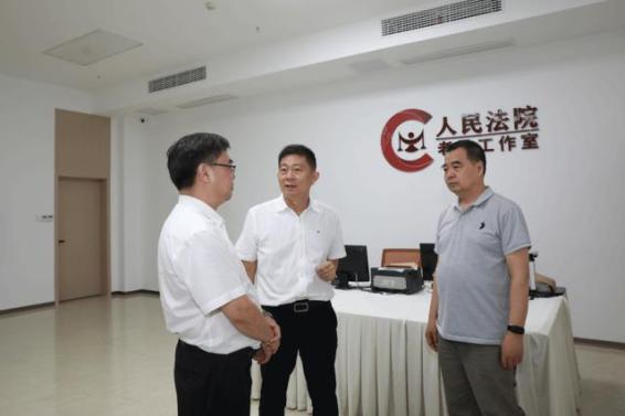 武汉海事法院贾石松院长一行来院调研交流