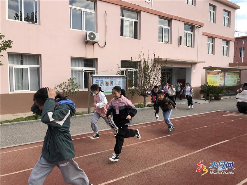 烟台九中举行防震疏散演练与防欺凌安全教育