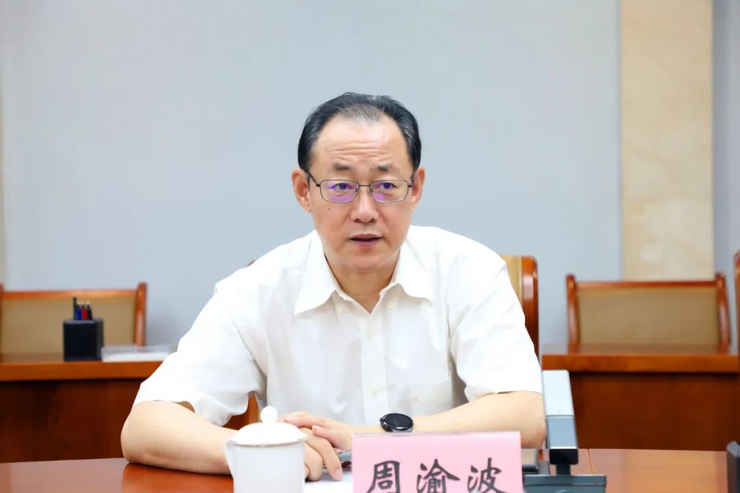 何朝建会见中国国新党委书记,董事长周渝波一行
