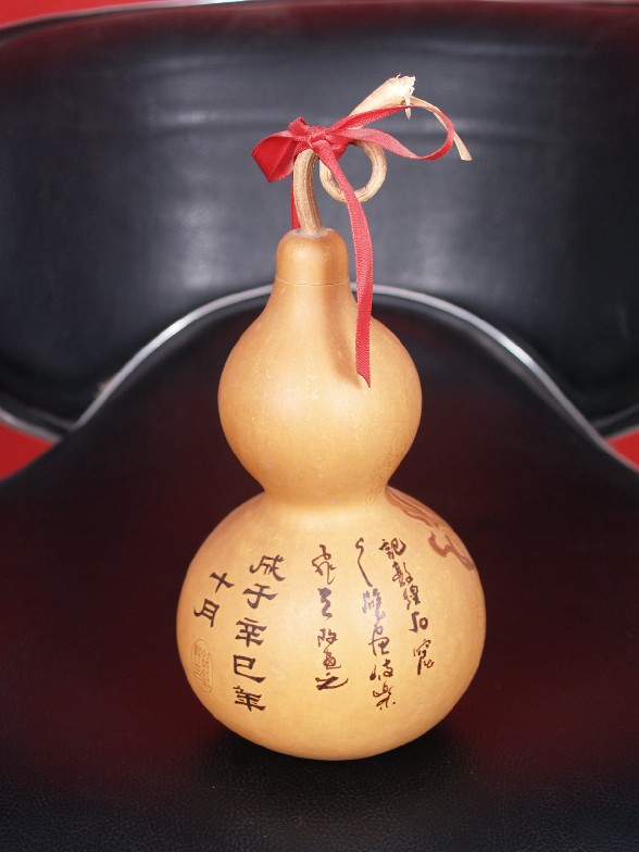 中药店门前为何常挂葫芦