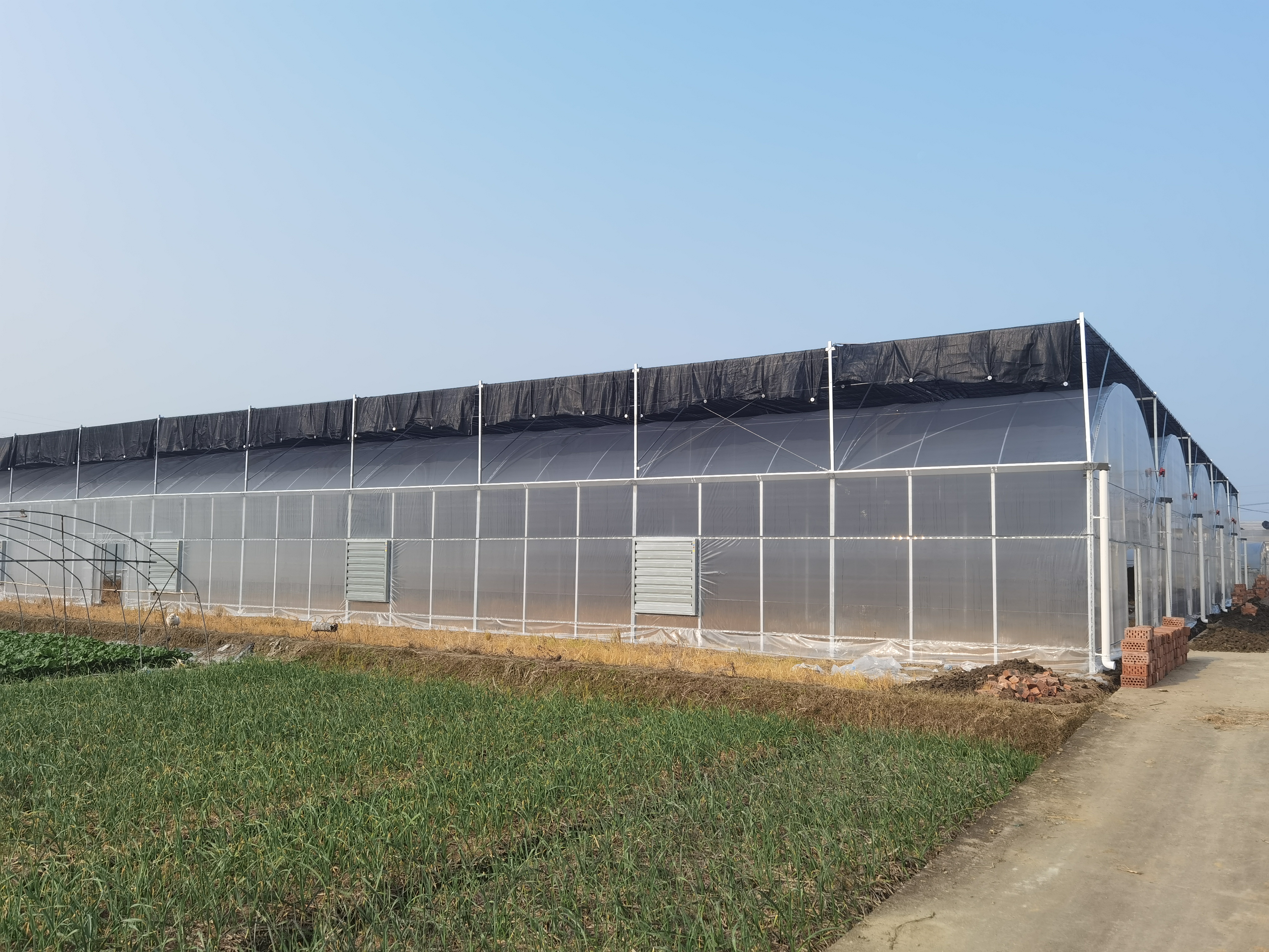 温室大棚套棚应该怎么搭建?如何选择合适的材料?