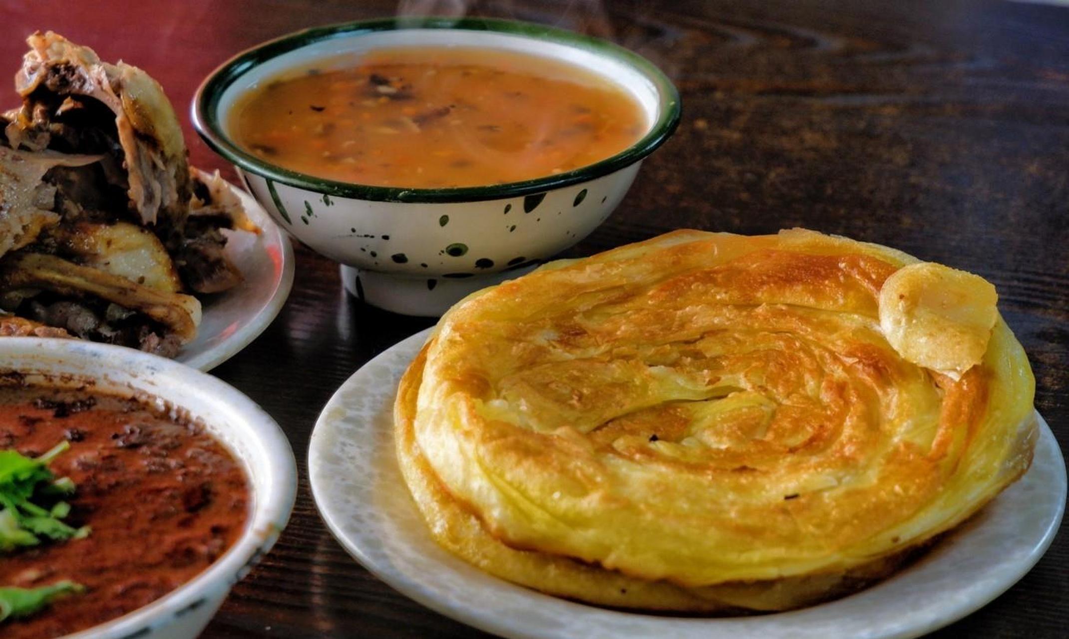 【杨家吊炉饼】比豆腐脑还嫩的鸡蛋糕 杨家吊炉饼是 沈阳 的特色小吃