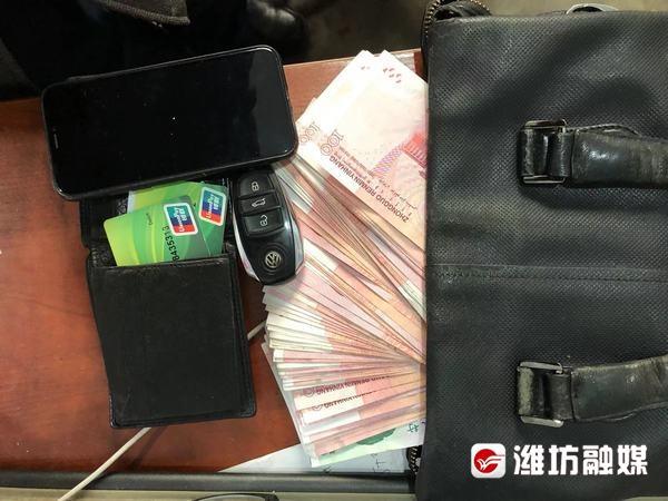 拾金不昧,出租车司机被"硬塞"600元感谢金