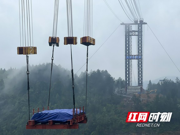 湖南s253公路項目塗乍特大橋纜索吊裝系統試吊圓滿成功