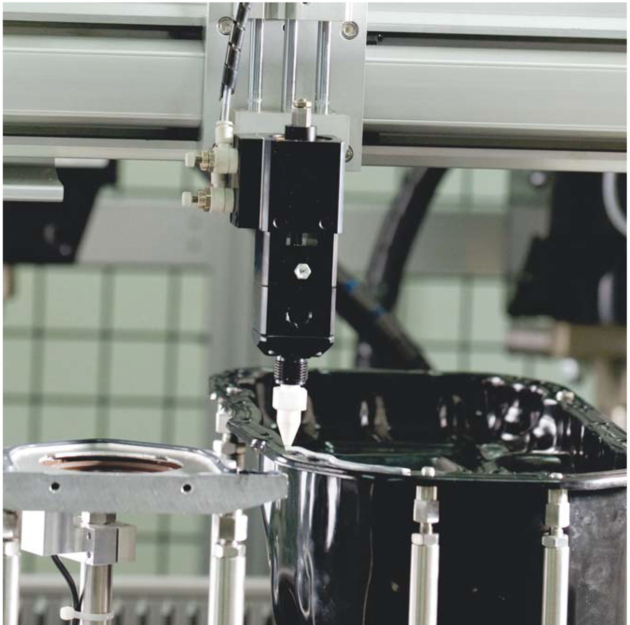 关于自动点胶,机器人会不会完全代替人工作业?