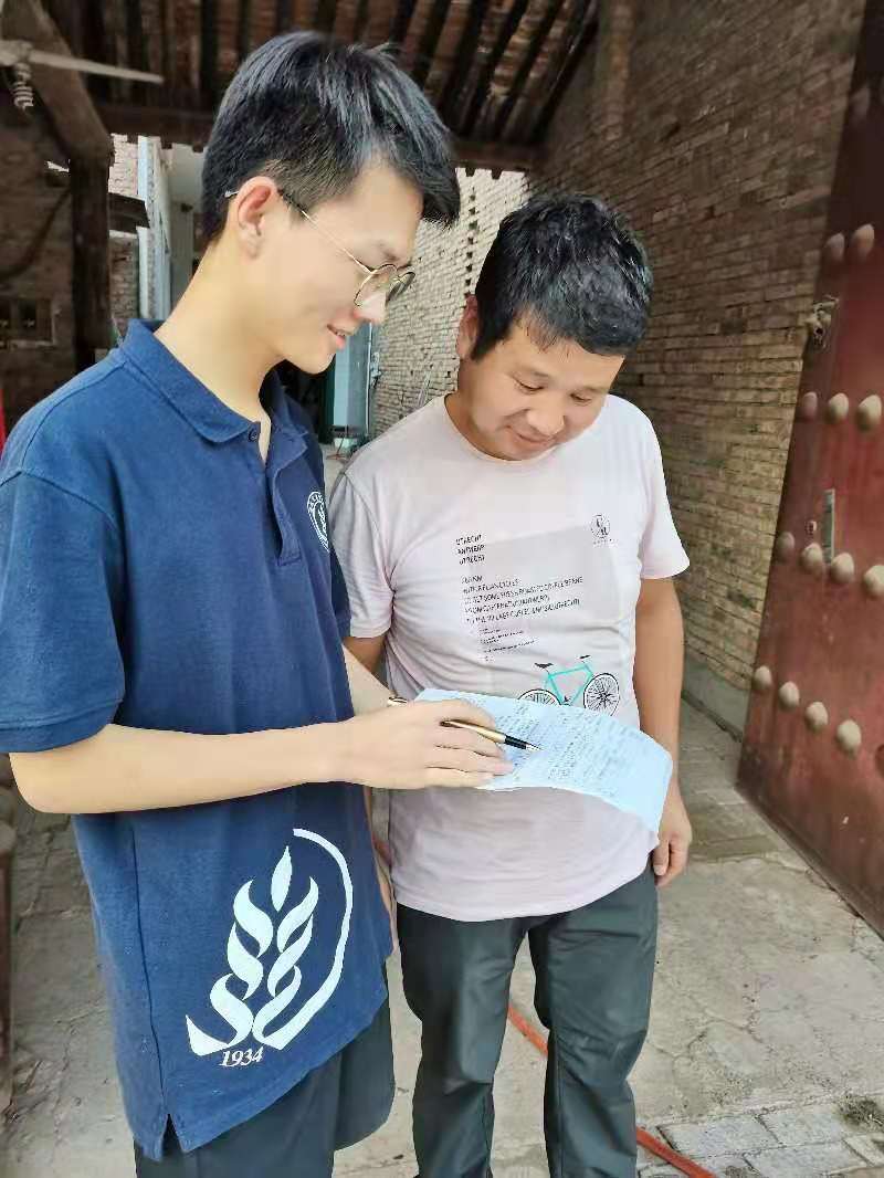  三下乡>大学生实地走访了解百姓生猪需求