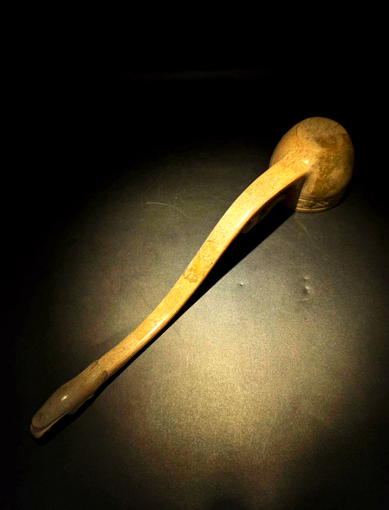 汉代龙头酒勺:从酒文化到权力象征