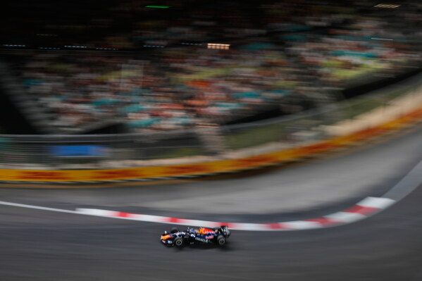 1 of 3 | Red Bull driver Max Verstappen of the Netherlands steers his car during the qualifying session ahead of the Singapore Formula One Grand Prix in Singapore, Saturday, Oct. 10, 2026. (AP Photo/Vincent Thian) License this photo