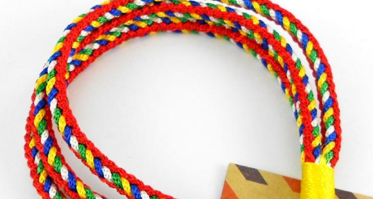 编花绳的过程怎么写30字