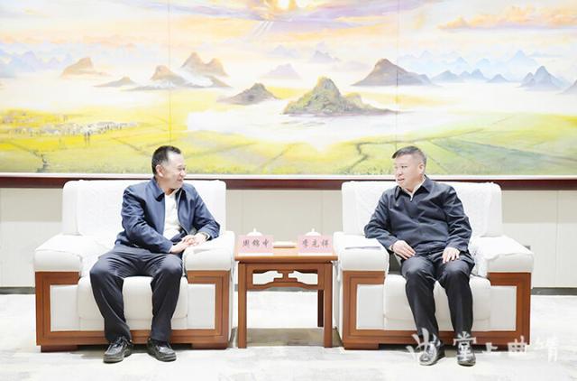 李先祥会见江西省地质局副局长周锦中一行