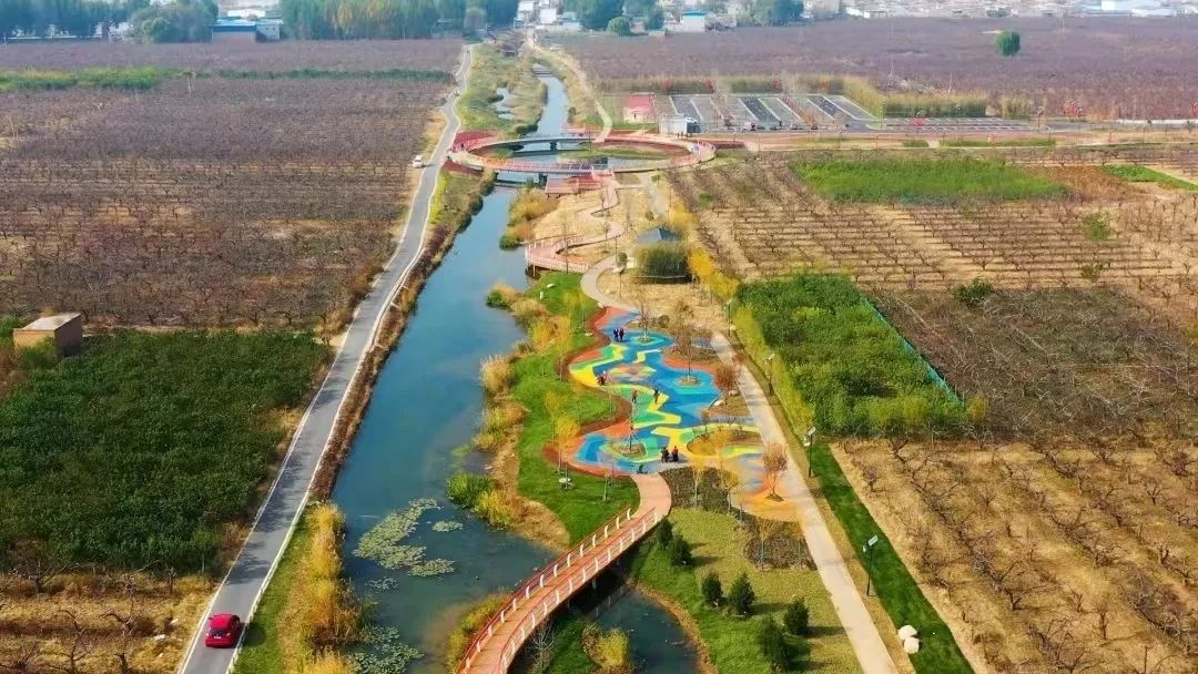 《人民日报》报道雄安新区雄县马蹄湾村:"梨"花香里说丰年
