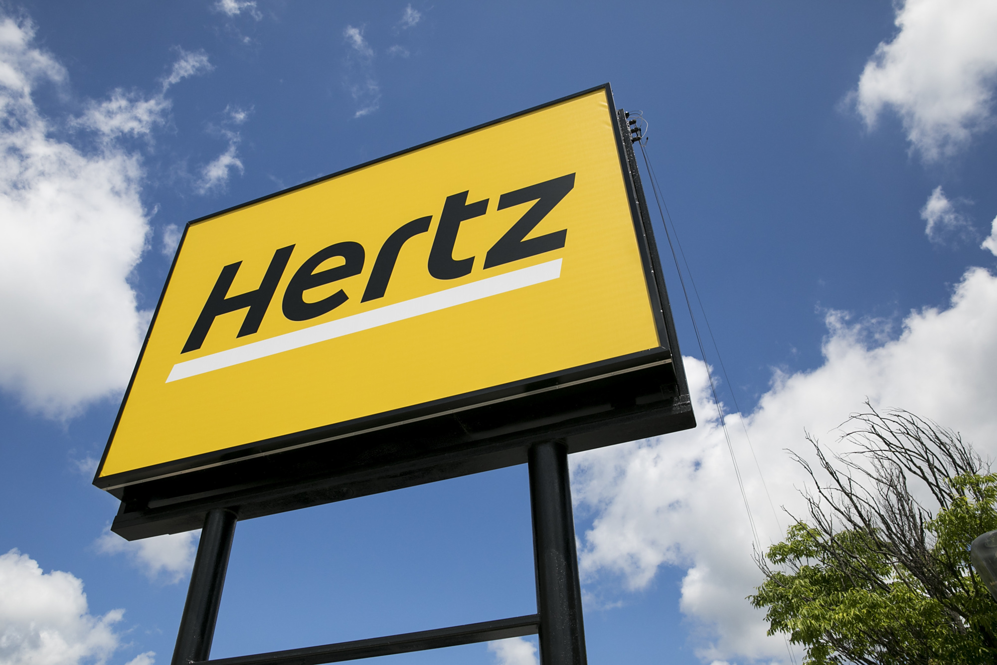 从破产到购买10万辆特斯拉汽车,赫兹怎么做到的?