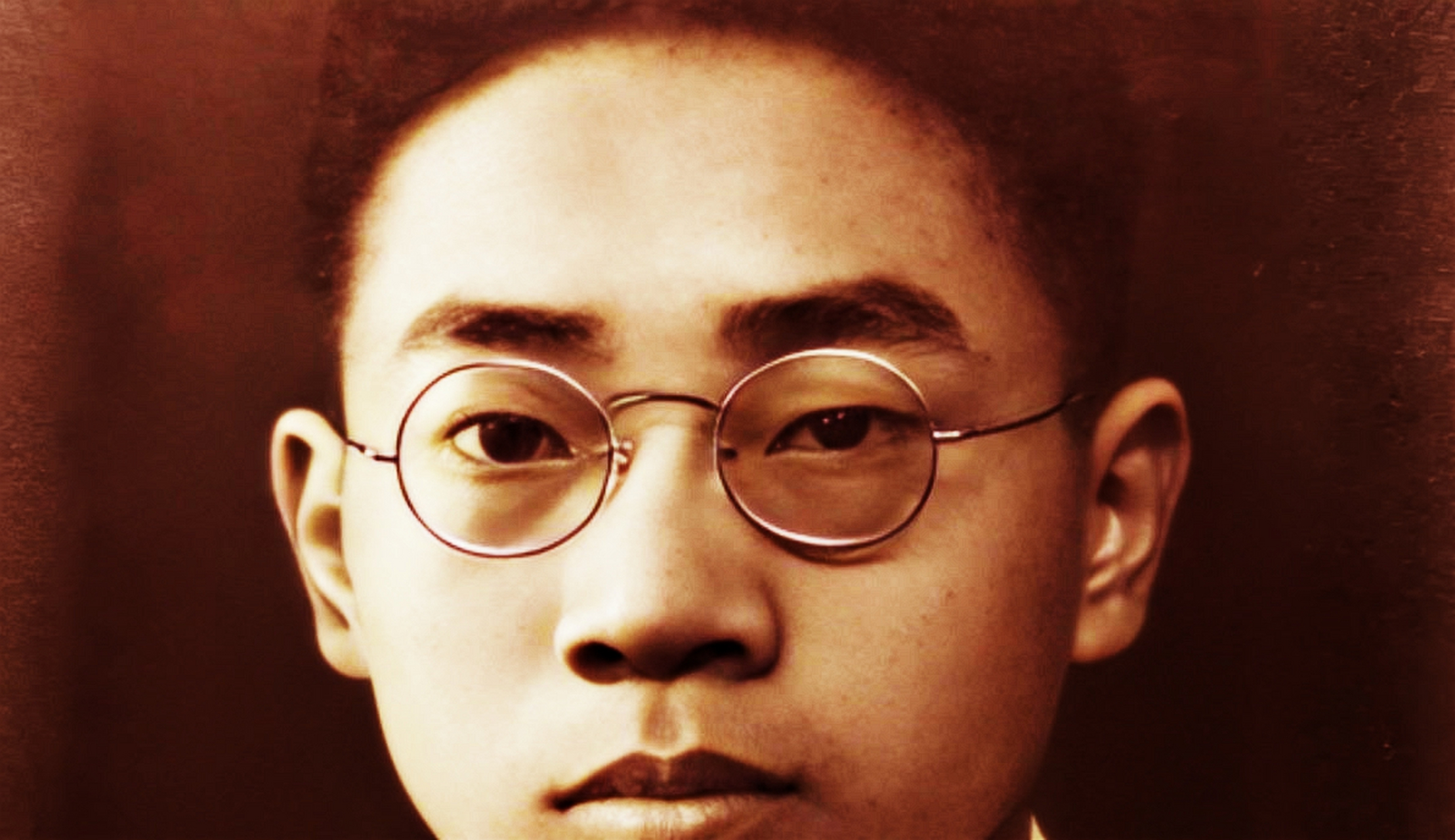 1940年,华罗庚在清华大学学习数学.二十三岁的学生皱了皱眉.