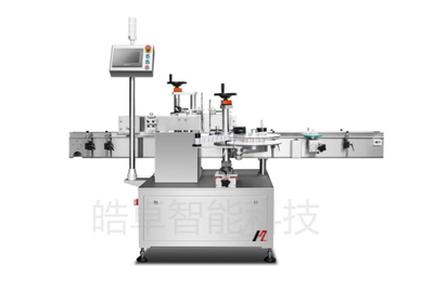 不干胶贴标机是现代机电一体化产品