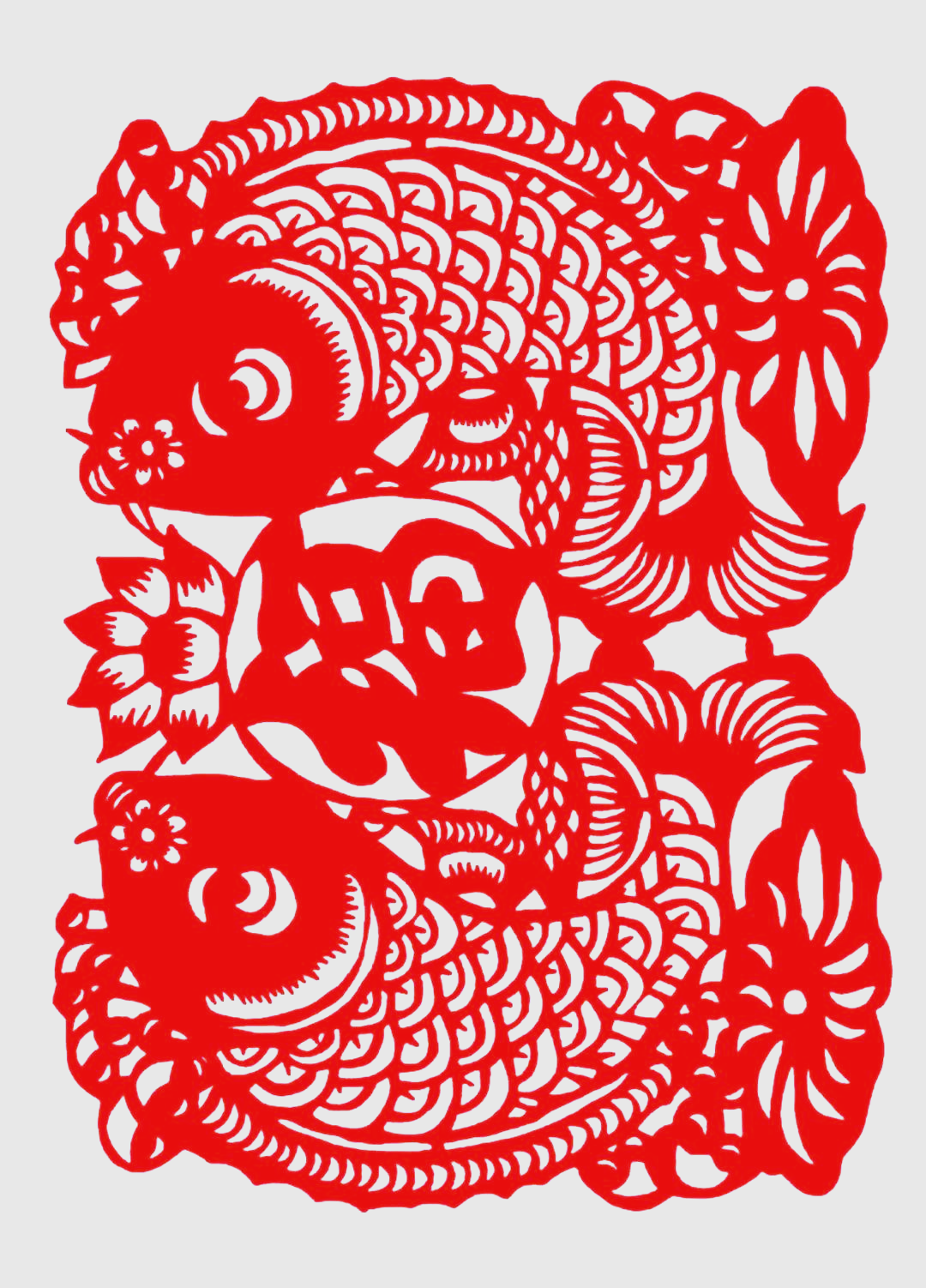 剪纸完成后,福字静静地躺在红纸上,如同一个熟睡的婴儿,等待着被唤醒