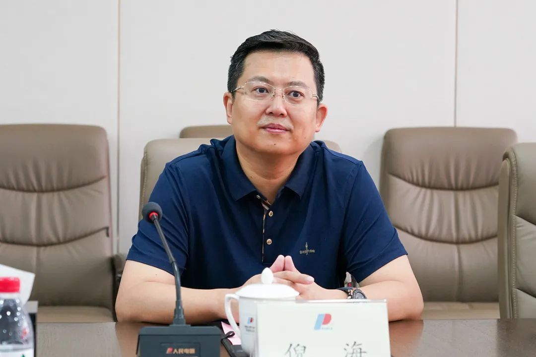 人民控股董事长郑元豹会见东北电力设计院院长倪海一行