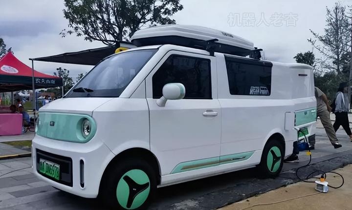 旅行摆摊,新能源露营售货车来袭,橙仕01纯电动车变身地摊床车