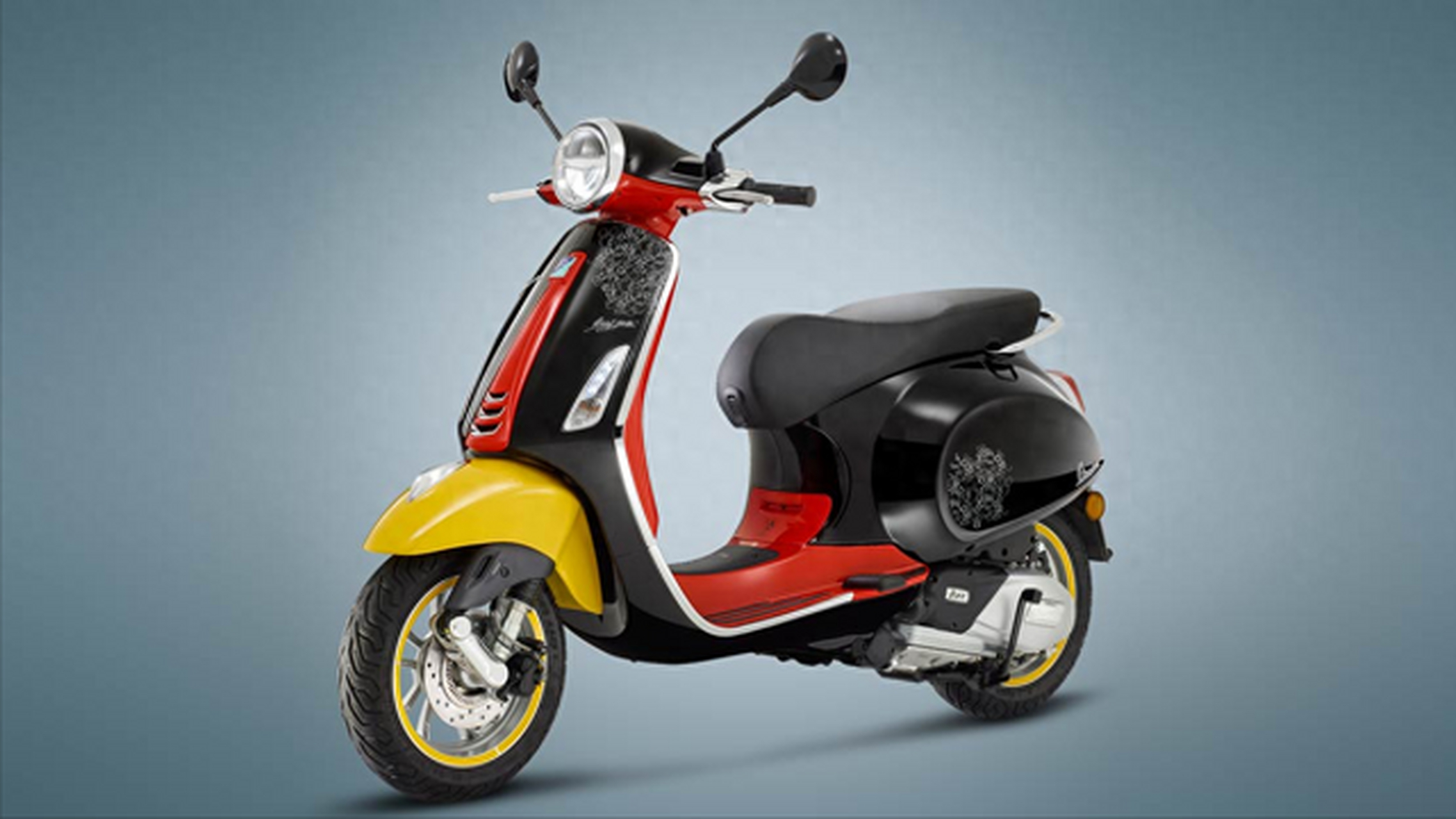 vespa推出迪士尼联名版primavera踏板车,以米老鼠为灵感,采用经典的米