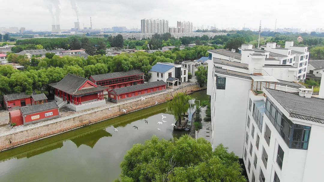 图为西慈航寺与河道交相辉映图为大激店村古戏楼图为夕阳下的大激店村