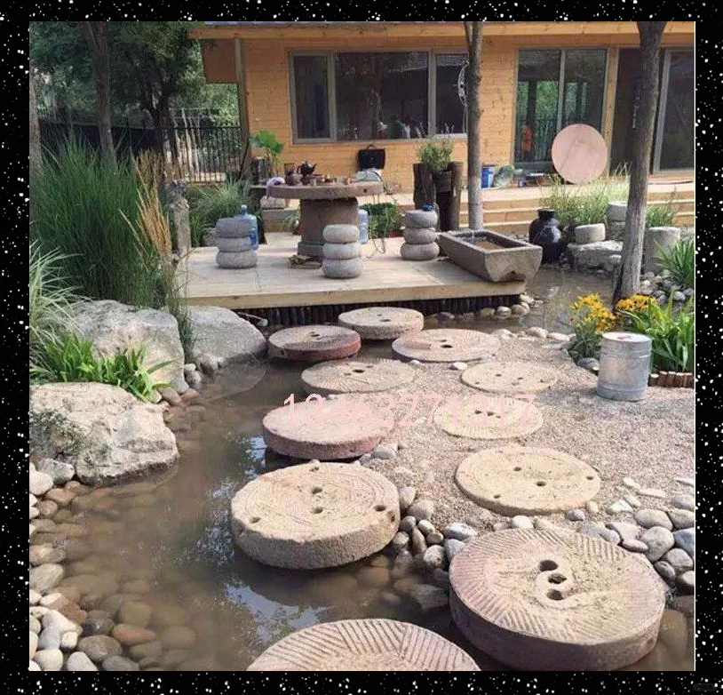 石磨重焕生机,成庭院新景致