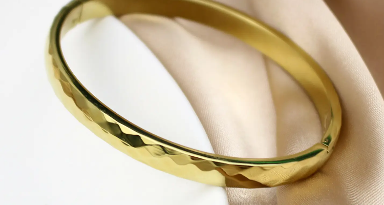 钛钢和金子能一眼看出来吗