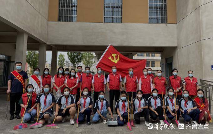 大手拉小手共创文明城!东昌府区阳明小学开展主题党日活动
