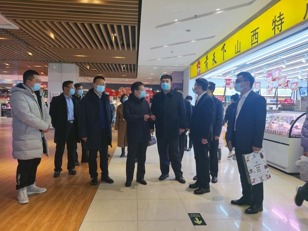 高屹城局长一行调研我市商业零售业发展情况