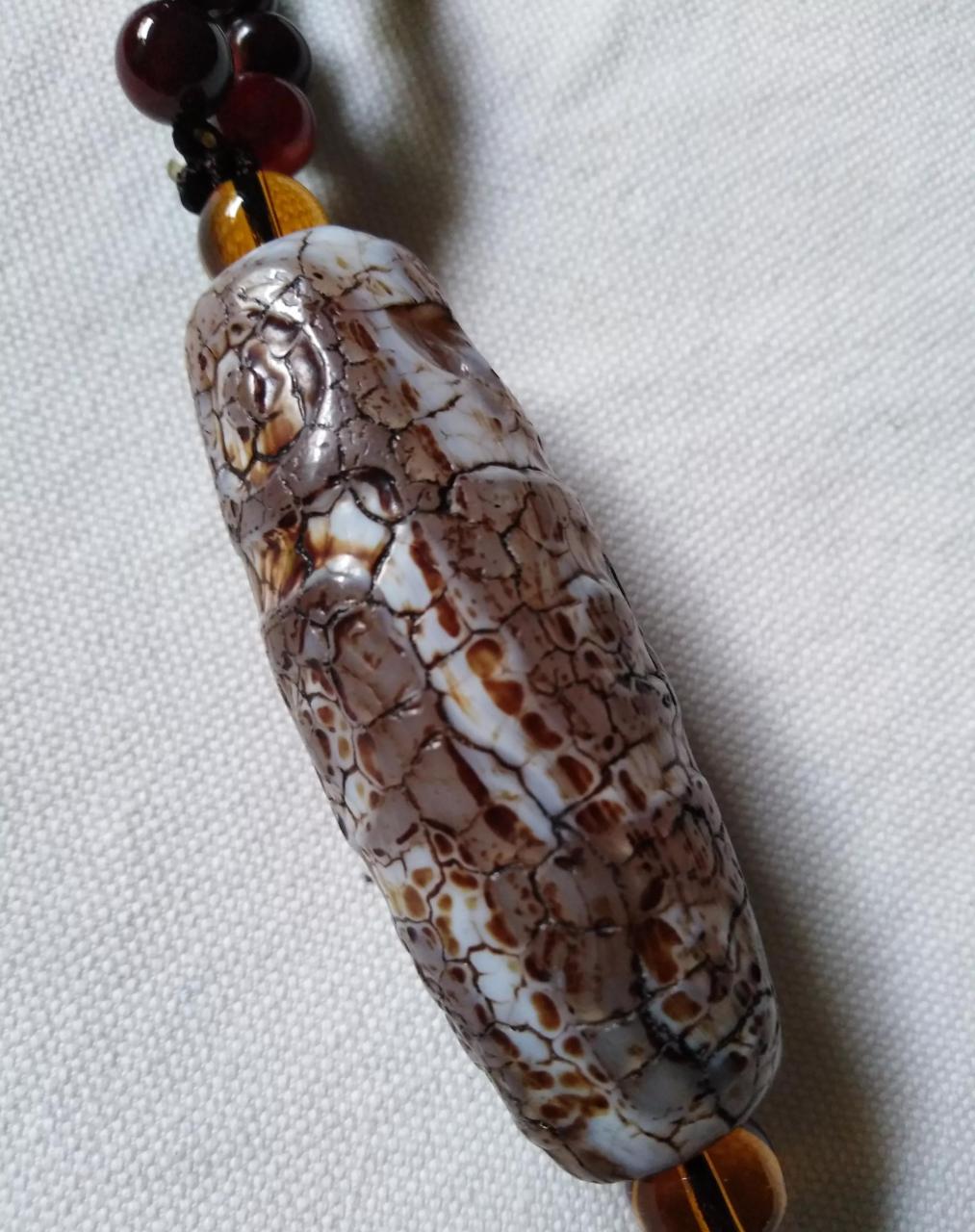 从磨损程度及开片纹看天珠之新老