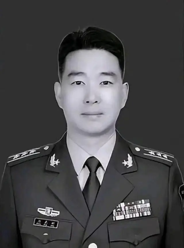 烈士周昆训魂归故里