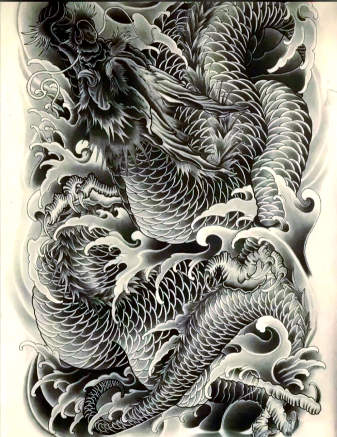 龙纹身手稿的寓意:王者的象征与内心的强大