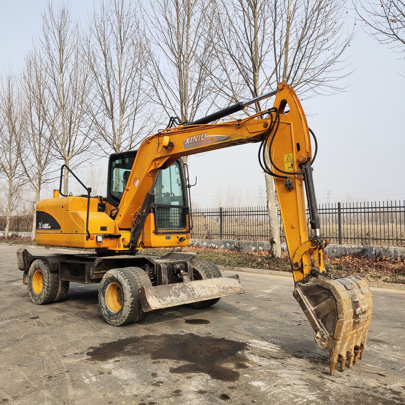 个人转让一台犀牛85轮式挖掘机 二手犀牛抓木机 二手犀牛挖机