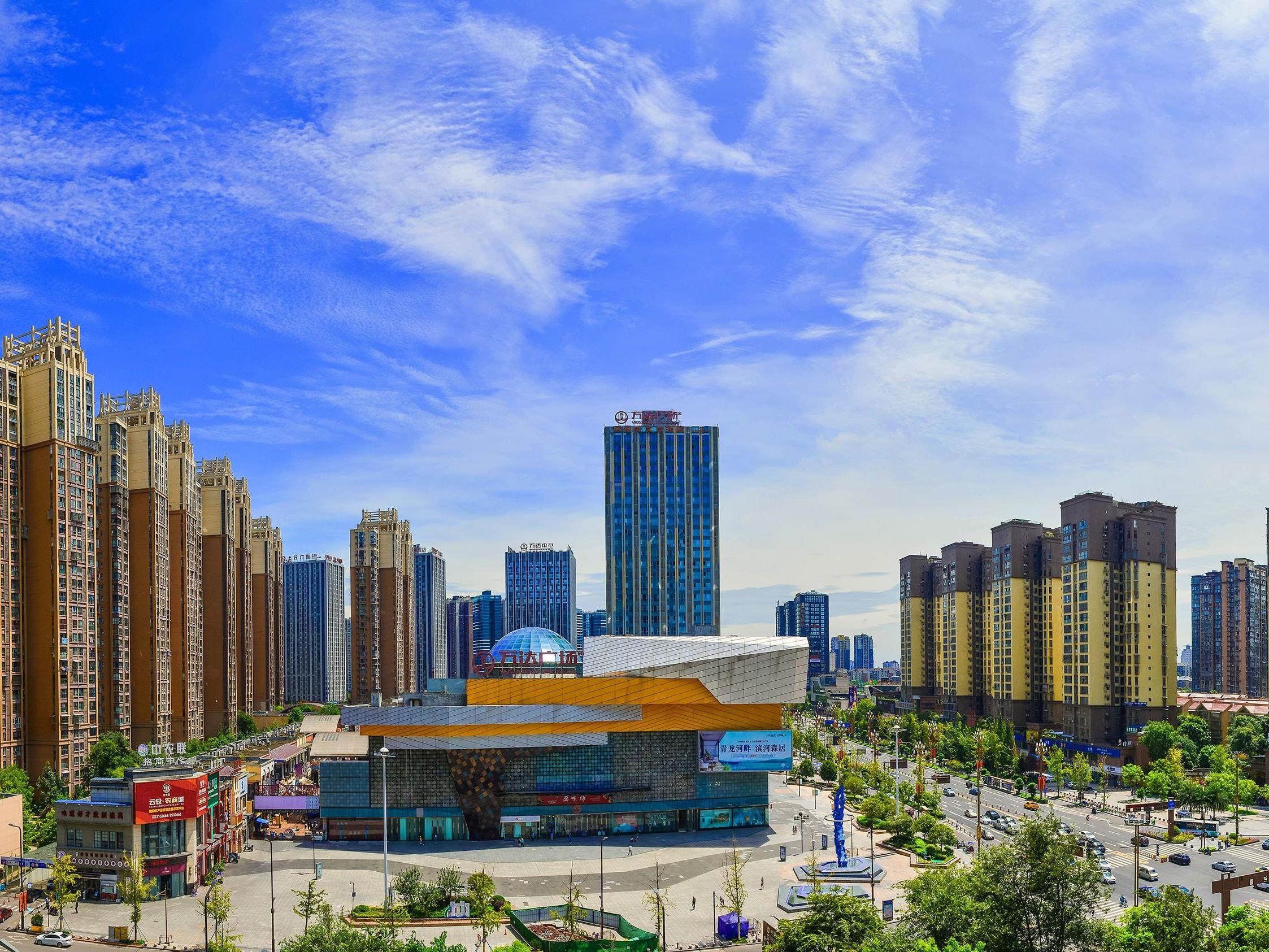 摄影家屈玉徽:用镜头见证城市巨变 记录甜蜜生活|内江这十年