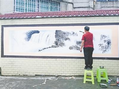 金沙二中家委会义务为学校制作文化墙